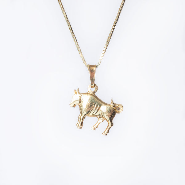 A gold-plated silver  Taurus necklace featuring a Taurus zodiac sign pendant, accompanied by a 40cm chain.
