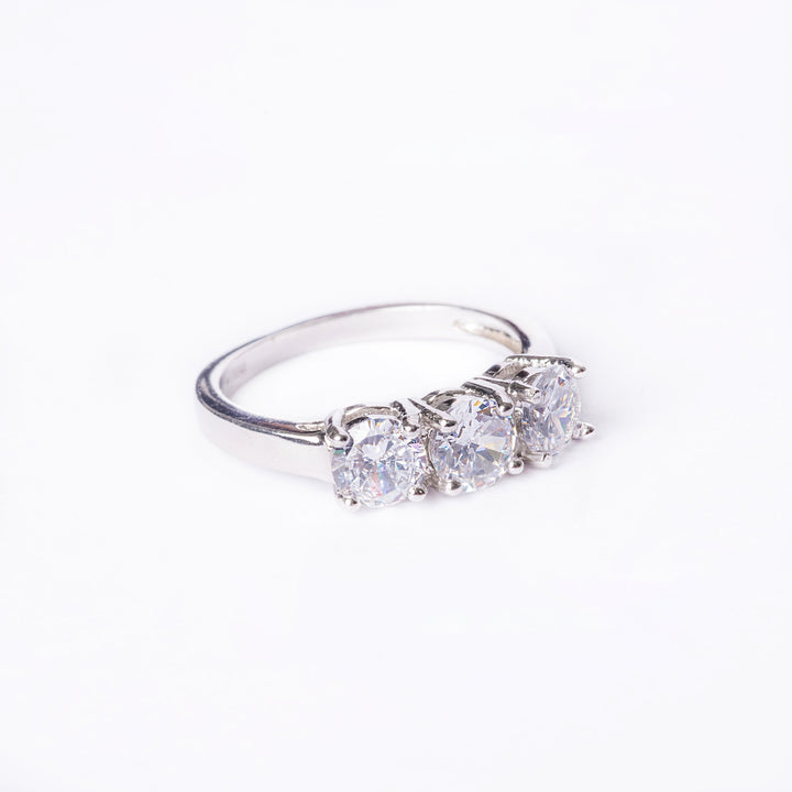A right side view of the Trilogy Ring standing in the center of the image against a white background. 