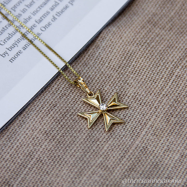 Wallpaper image of Valletta Gold Maltese Cross. 