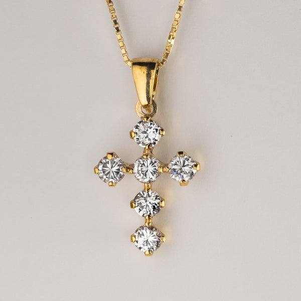 A birdview of White Zircons Cross Pendant