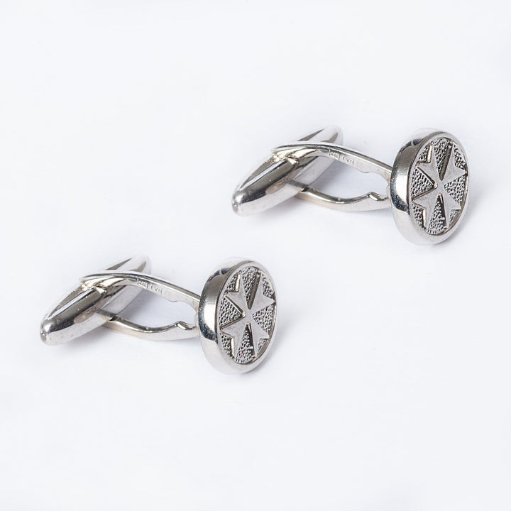 Right side view of Xandru Silver cufflinks standing in the center of the image against a white background. 