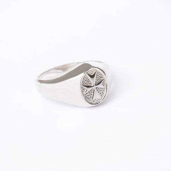 Xandru Silver Ring with an embossed geometric design on the top surface, displayed against a white background.