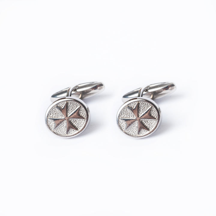 A close up view of Xandru Silver cufflinks.